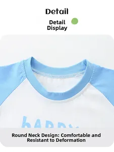 Detail of boys' raglan T-shirt showing round neckline and Happy print in blue