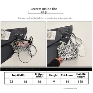 Size chart and capacity detail of leopard print crossbody bag with pearl bow