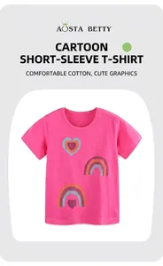 Detailed view of rose pink cotton T-shirt featuring sequined rainbow and heart patterns