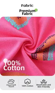 Detail of 100% cotton fabric with vibrant pink base and colorful heart pattern prints