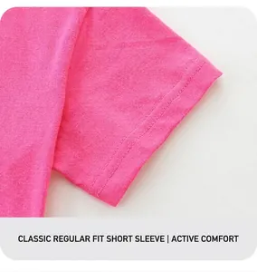 Detail view of pink cotton t-shirt sleeve showing premium knitted texture and neat stitching