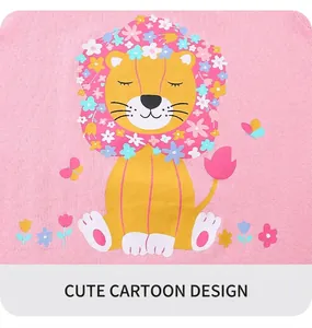 Detailed close-up of a cartoon lion and floral print on a pink cotton kids' t-shirt