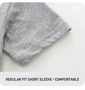 Détail d'un t-shirt gris pour garçon en coton avec couture double aiguille sur la manche