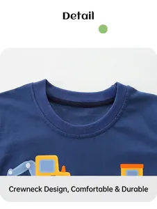 Close-up of a blue boys' t-shirt featuring a yellow excavator print and ribbed crew neck