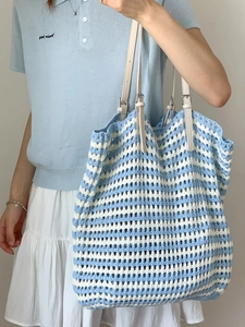 Blue and white striped crochet tote bag with white leather straps for summer beach