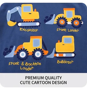 Close-up of boys t-shirt featuring yellow cartoon construction truck prints on navy fabric