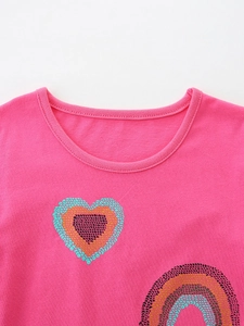 Girls' bright pink cotton t-shirt with artistic heart print and classic round neck