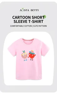 Close-up of pink cotton t-shirt with cute cartoon print and classic round neckline
