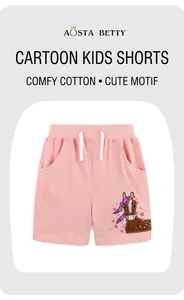 Detail of pink cotton shorts for girls featuring elastic waist and pony embroidery