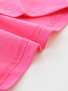 Close-up of rose pink girls' cotton T-shirt featuring durable double-needle stitching