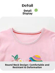Detail of pink cotton girl's t-shirt showing comfortable crew neck and cartoon print