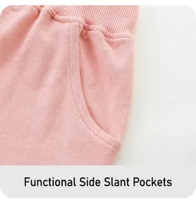 Detail of pink cotton knit shorts with elastic ribbed waistband and side pockets