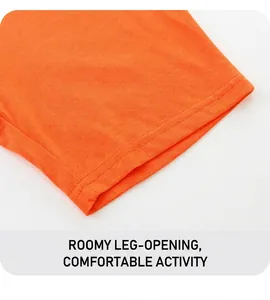 Close-up of boys knit cotton outfit showing orange shorts hem and neat double stitching