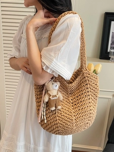 Handwoven shoulder tote bag in earthy tones with cute bear pendant and tulip decor