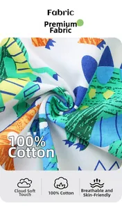 Détail macro du tissu 100% coton doux avec des motifs de dinosaures pour garçons