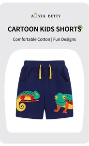 Close-up of kids navy cotton shorts featuring colorful chameleon embroidery and yellow drawstring
