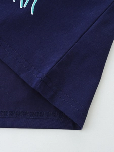 Detailed view of dark blue girls cotton T-shirt featuring high-quality hem stitching