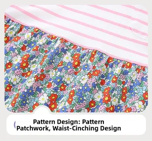 Detail of girls' dress showing striped knit top and vibrant floral print patchwork skirt