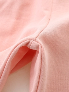 Pink knit cotton girls' sports shorts featuring durable reinforced crotch stitching details