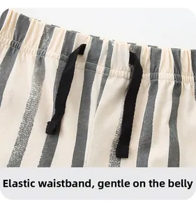 Elastic waistband with drawstring on boys' striped cotton shorts for comfortable fit