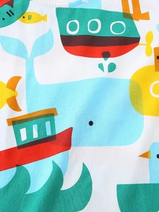 Kids cotton T-shirt featuring a colorful cartoon whale and sailboat ocean print
