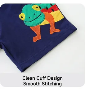 Detailed view of animal embroidery and neat double stitching on navy cotton shorts