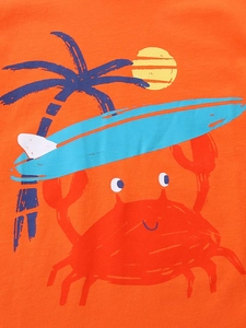 Boy's orange cotton summer t-shirt with a cute crab surfing and palm tree print