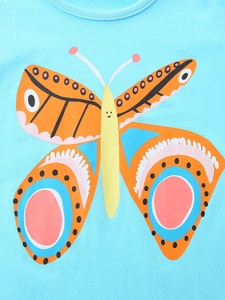 T-shirt fille bleu ciel avec grand imprimé papillon coloré et motif visage souriant