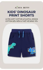 Détail du short en coton pour garçon avec cordon bleu et broderie de dinosaure