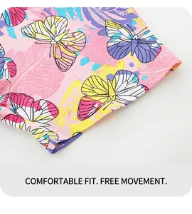Détail du short rose pour fille avec imprimé papillon et finitions à double couture