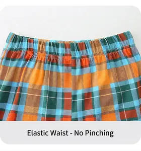 Close-up of elastic waistband on kids multi-color plaid shorts for comfortable fit