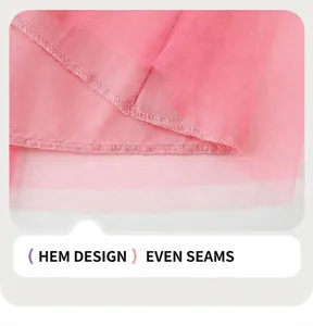 Vue détaillée de l'ourlet en tulle rose avec des coutures soignées et lisses