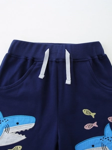 Navy blue knitted boys shorts with shark embroidery and white drawstring waist