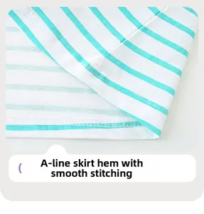 Detailed macro view of striped A-line dress hem with precise flat stitching and cotton fabric