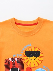 T-shirt orange en coton pour garçons avec imprimé lion et col rond