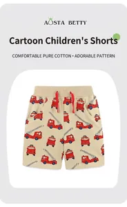 Detail of boys' cotton shorts with fire truck print, elastic waist and decorative drawstrings