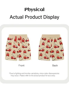 Detail of boys knit cotton shorts with cartoon fire truck print and drawstring waist