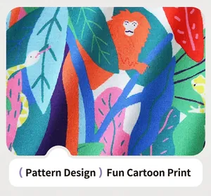 Detailed macro view of tropical floral fabric with cute lion and bird cartoon patterns