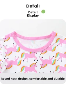 Vue détaillée du col rond rose sur le haut de pyjama enfant blanc motif licorne