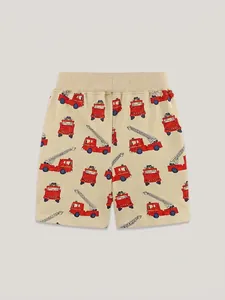 Beige cotton boys' shorts with red cartoon fire truck print and elastic waistband