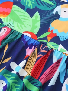 Girl's summer short sleeve dress with colorful tropical parrot and floral leaf prints