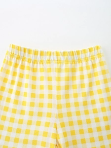 Girls summer gingham shorts with elastic waistband in yellow and white cotton fabric