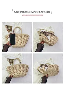 Detail view of woven straw handbag featuring heart scarf and size comparison with phone