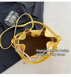 Top view of bright yellow bucket bag interior with magnetic snap and textured lining