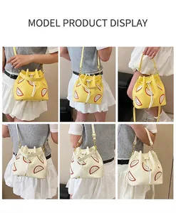 Detail shots showing lemon print bucket bags with crossbody straps and top handles