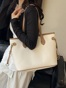 Large cream tote bag with brown straps and side drawstring for women's office wear