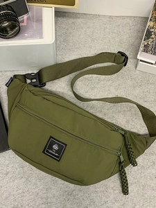 Olive green nylon dumpling waist bag with woven zipper puller for outdoor sports