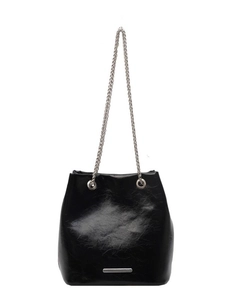 Minimalist black glossy leather bucket bag with silver metal chain strap and mirror finish