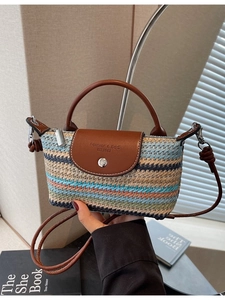 Handmade bohemian striped straw bag with brown leather handle for summer beach vacation
