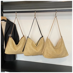Three woven straw tote bags in khaki showing black, brown, and beige shoulder strap details
